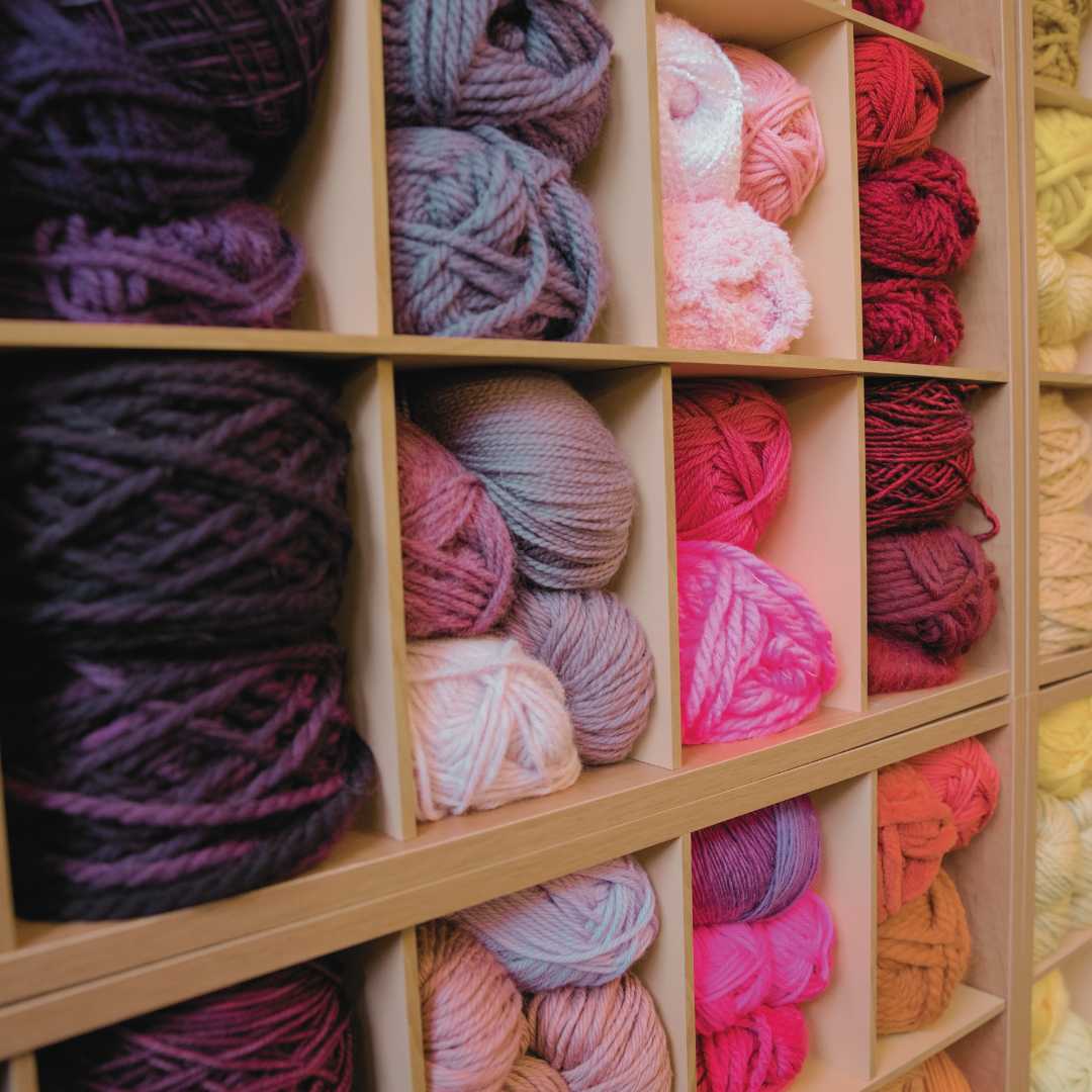yarn shelf neatly organized by style and color. Just one of our ideas for storing yarn.